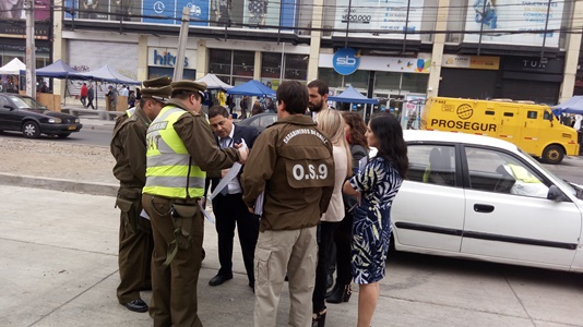 Reconstitución de escena en plaza de Maipú