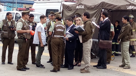 Reconstitución de escena en plaza de Maipú