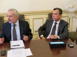 El Fiscal Regional Raúl Guzmán y el Fiscal Jefe de Delitos Violentos y Flagrancia Patricio Pérez, durante la reunión de esta mañana en la Intendencia.