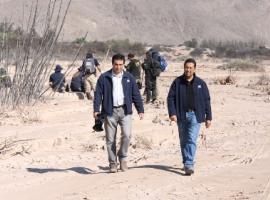 Los fiscales Gabriel Meza y Luis Zepeda han participado de las tareas de búsqueda en el sector del río Copiapó.